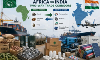 Please generate a realistic image of dimensions 1536 by 1024 from the following theme: Two-way trade corridors between Africa and India showing exports of African minerals, agricultural goods, and energy alongside Indian pharmaceuticals, machinery, textiles, and renewable-energy equipment.