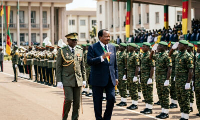 President Paul Biya reviewing Cameroonian troops in an archive photo, amid growing concerns over military loyalty and succession.