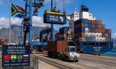 Cargo containers being loaded at a South African port, serving as a logistics hub for African exports to BRICS nations.