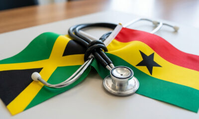 Jamaican and Ghanaian flags, bound with a stethoscope symbolizing the bilateral nurse recruitment agreement between Jamaica and Ghana.