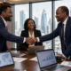African business leaders shaking hands across a boardroom table, symbolizing trust as a business asset in cross-border investment