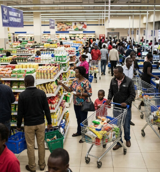 Shoppers in a bustling Nairobi supermarket, illustrating the surface-level activity masking the East Africa retail capital crisis.