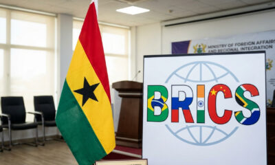 Ghanaian flag next to the BRICS alliance logo, representing Ghana's formal cabinet-approved application to join the bloc.
