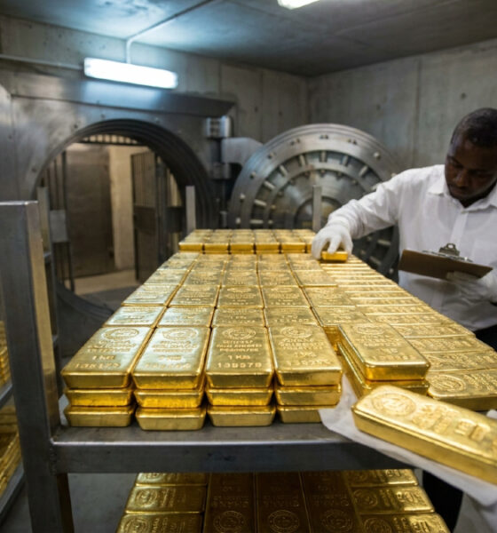 Gold bars stacked in a vault, representing Ghana’s GoldBod reserves