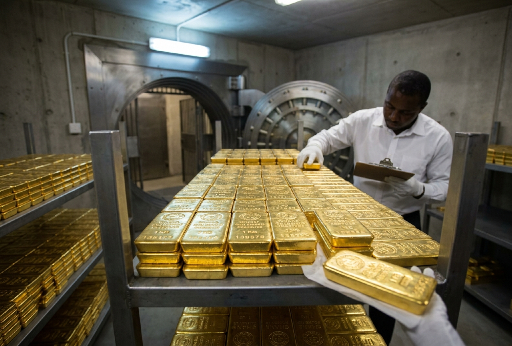 Gold bars stacked in a vault, representing Ghana’s GoldBod reserves