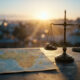 Scales of justice beside a map of Africa, symbolizing the debate over good governance in Africa